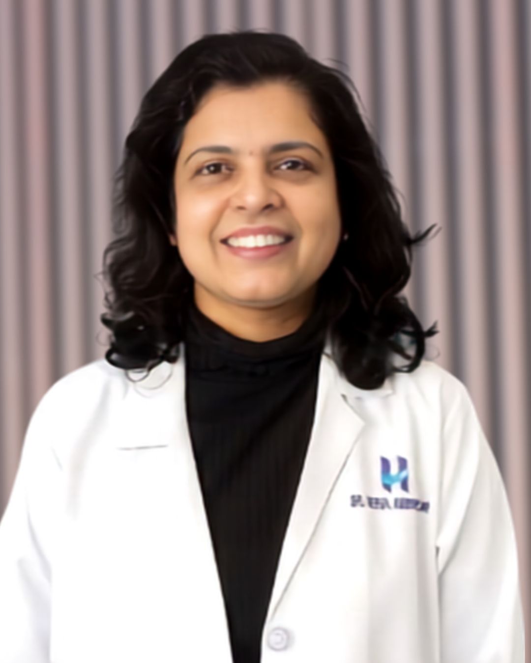Dr. Veena Ambewadikar